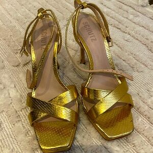 Gold ankle strap heels perfect for a date night!